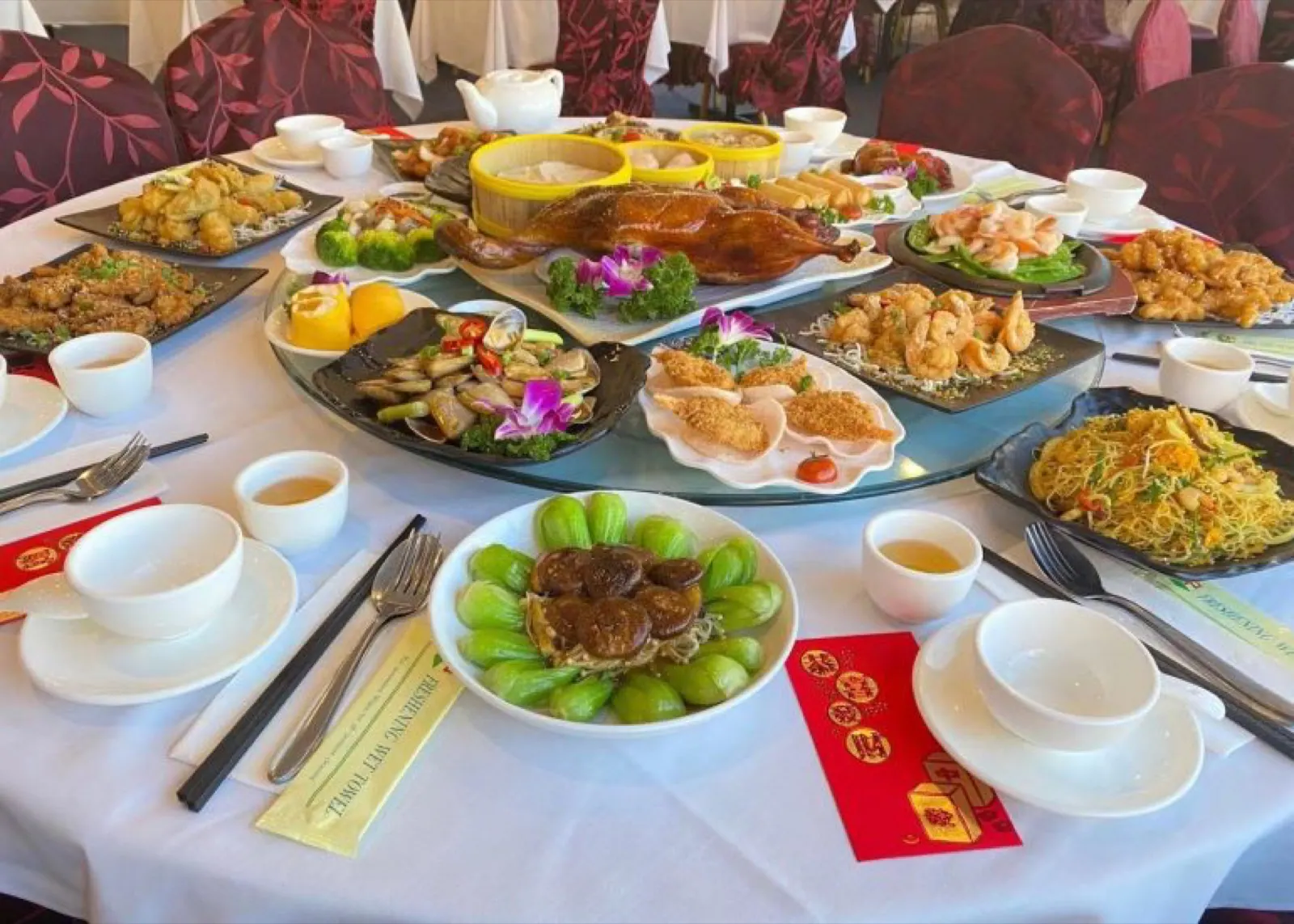 A banquet table filled with Chinese seafood dishes at Silver Territory restaurant in Sydney